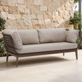 Bronze and charcoal handwoven 3 seater sofa styled in a living room setting