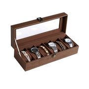 Angled view of the open watch box holding watches and beaded bracelets