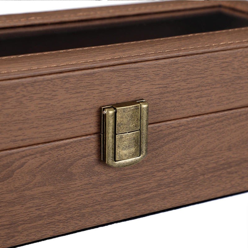 Close-up of the antique brass clasp on the front of the closed watch box