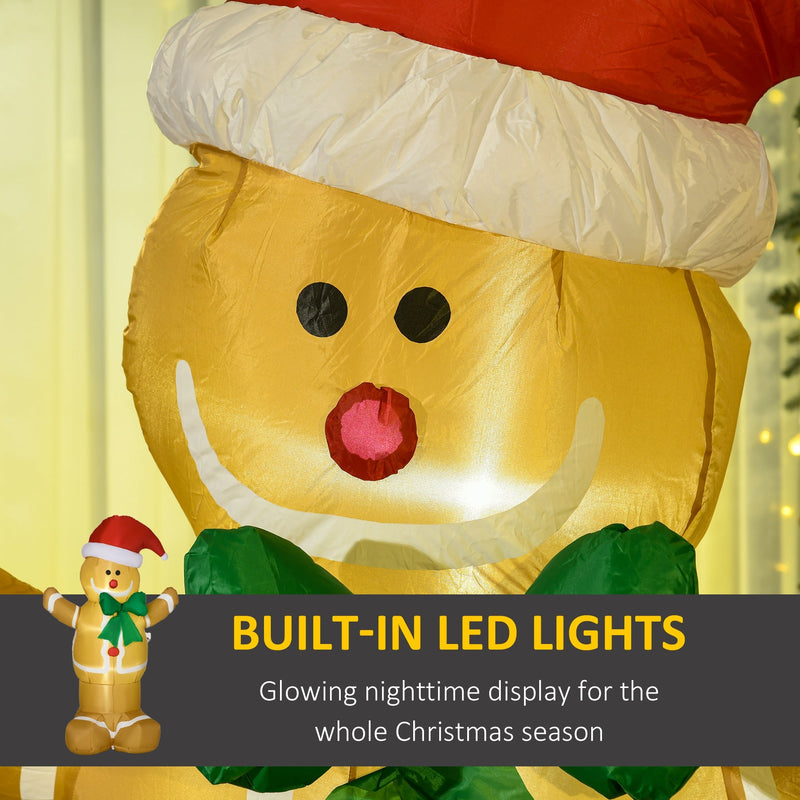 Close-up of the gingerbread man's face and Santa hat with built-in LED lights label