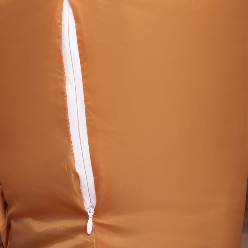 Close-up of a white zip on the brown reindeer fabric