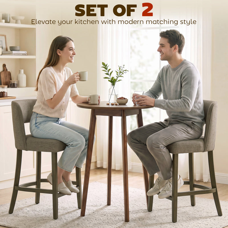Couple chatting at a small table on two brown bar stools