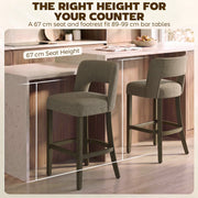 Two brown bar stools at a counter showing the 67 cm seat height for 89-99 cm bar tables