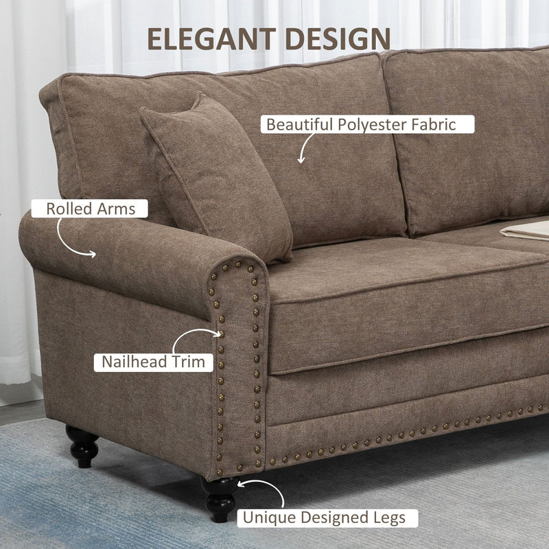 Rolled arm and nailhead trim detail on brown polyester fabric sofa