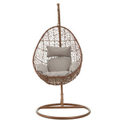 Brown rattan effect hanging chair with grey cushion, studio shot