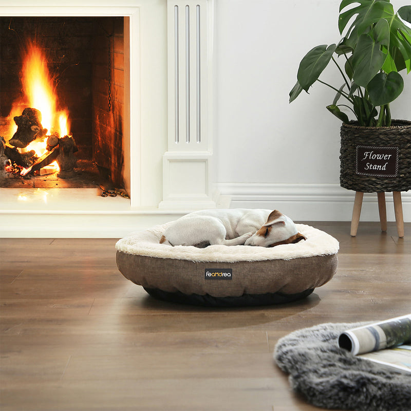 Top view of the round dog bed showing the padded edge