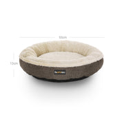Dog bed styled in a home living room setting