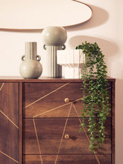 Brown geometric pattern sideboard with hairpin legs in a lifestyle setting