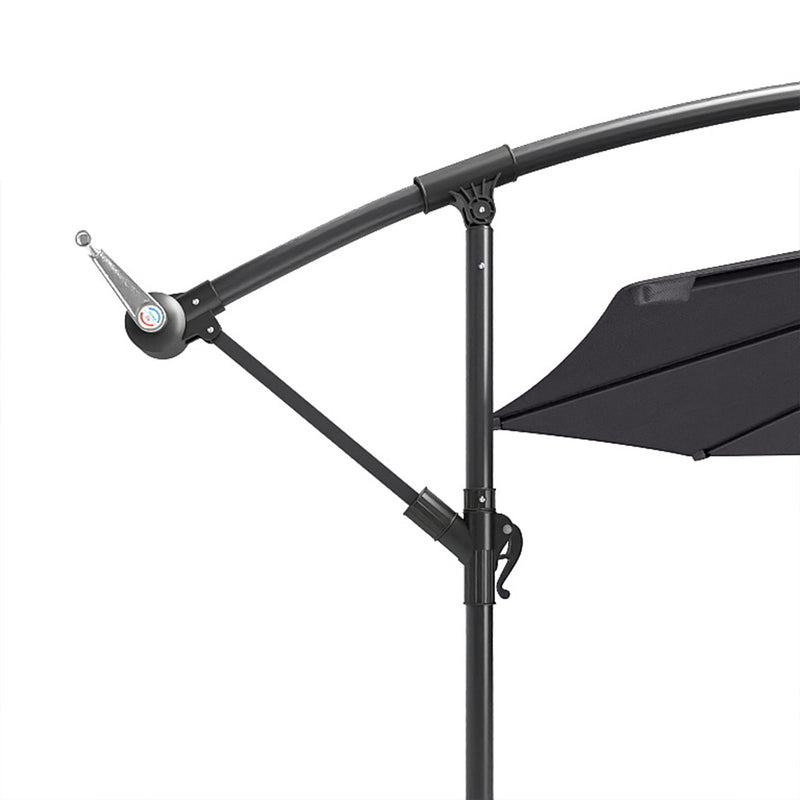 Close-up of the curved arm, pole joint and crank on the grey parasol