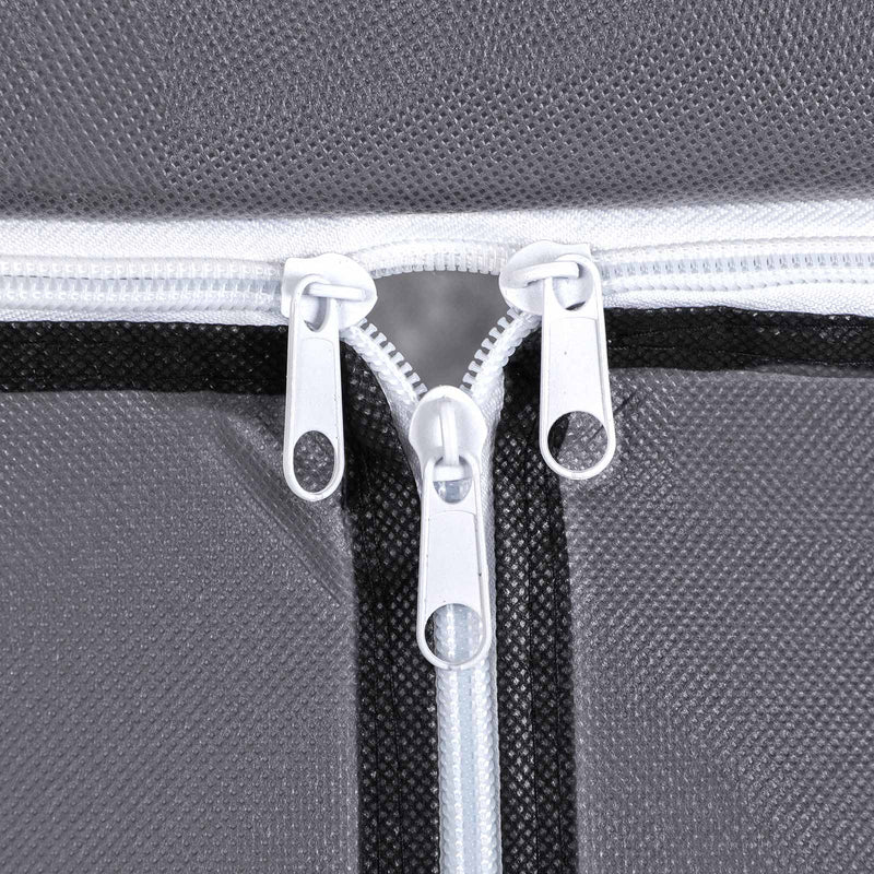 Close-up of the two white zip pulls meeting on the grey fabric cover
