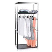 Bare steel frame of the wardrobe with shirts and a dress on the hanging rail and folded clothes on the top shelf