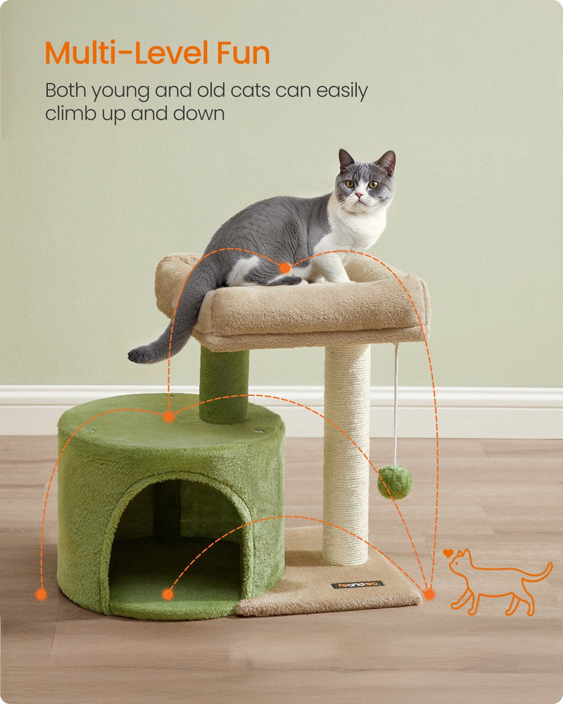 Cat climbing between the condo and top perch of the Feandrea cat tree