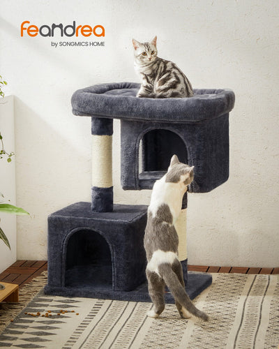 Lifestyle photo of a cat climbing the Feandrea cat tree tower in a living room
