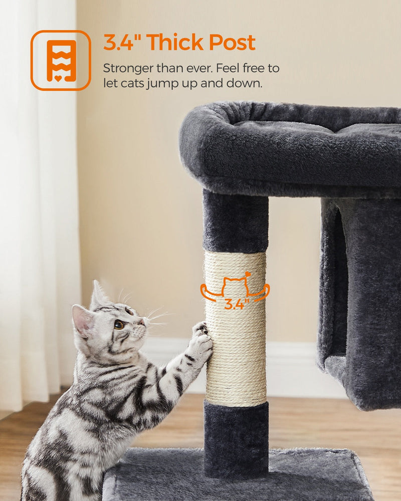 Close-up of a kitten scratching the sisal-wrapped 3.4 inch thick post