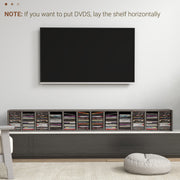 Towers laid on their side under a TV to store DVDs