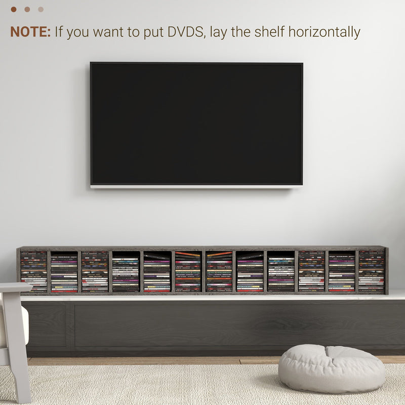 Towers laid on their side under a TV to store DVDs