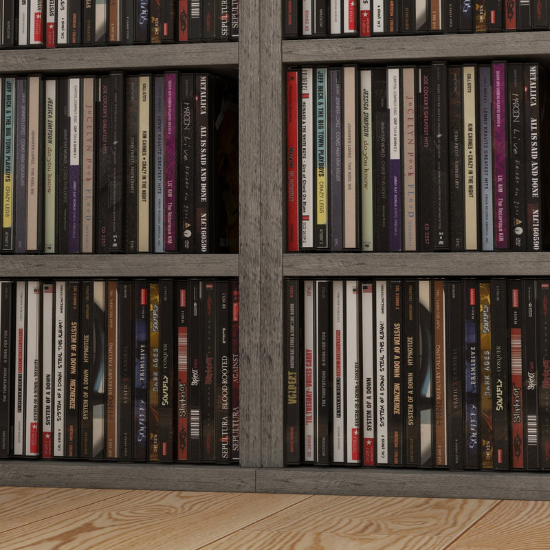 Close-up of compartments packed with CD cases