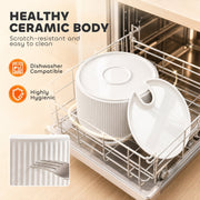 Ceramic fountain bowl and lid on a dishwasher rack with a scratch-resistance close-up