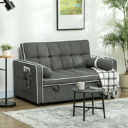 Charcoal grey sofa bed styled in a living room with a side pocket holding a magazine