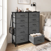HOMCOM grey fabric chest of drawers styled in a bedroom with one drawer open showing folded clothes