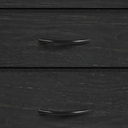 Close-up of the black drawer handles on the wood-grain fabric