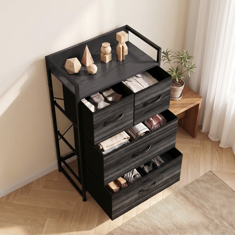 Three-quarter view with ornaments on the top shelf and folded clothes in each drawer