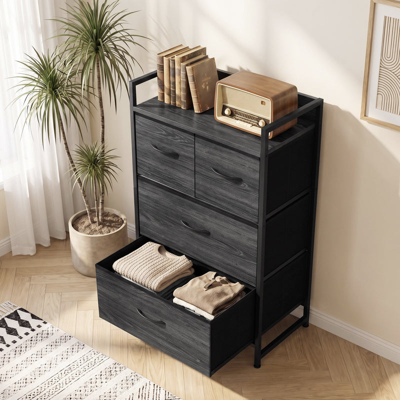 Chest in a bright corner beside a potted palm with books and a radio on top