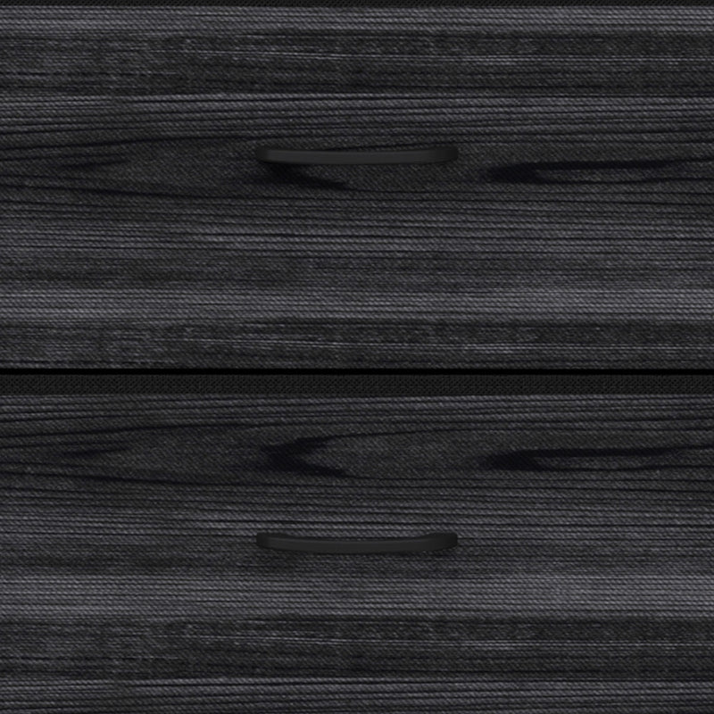 Close-up of the wood-grain texture across two drawer fronts
