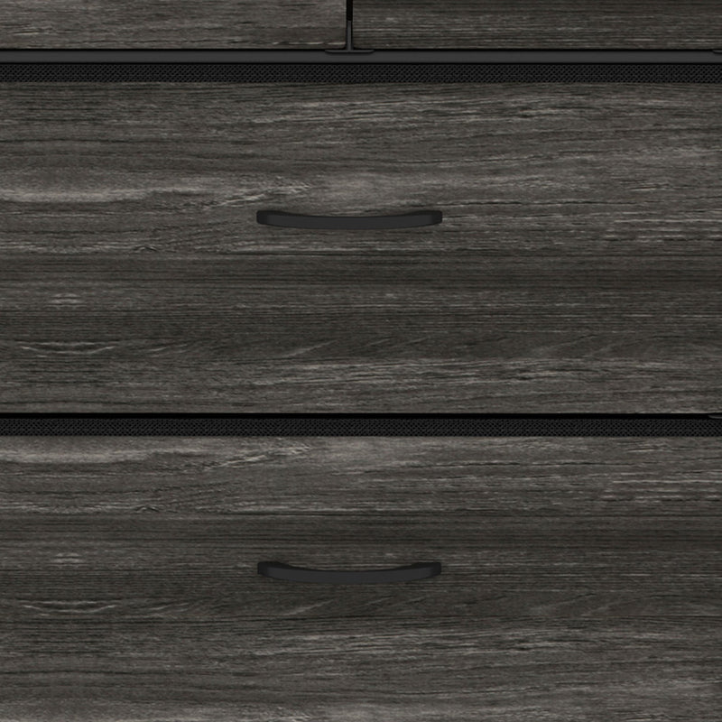 Close-up of the drawer fronts with slim metal pull handles