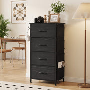Black fabric chest of drawers styled in a living room next to a dining table