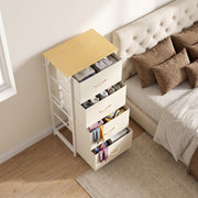 Chest of drawers beside a bed with drawers open and scarves inside, shown in beige