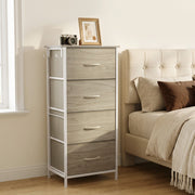 Chest of drawers beside a bed with a camera and photo frame on top, shown in oak