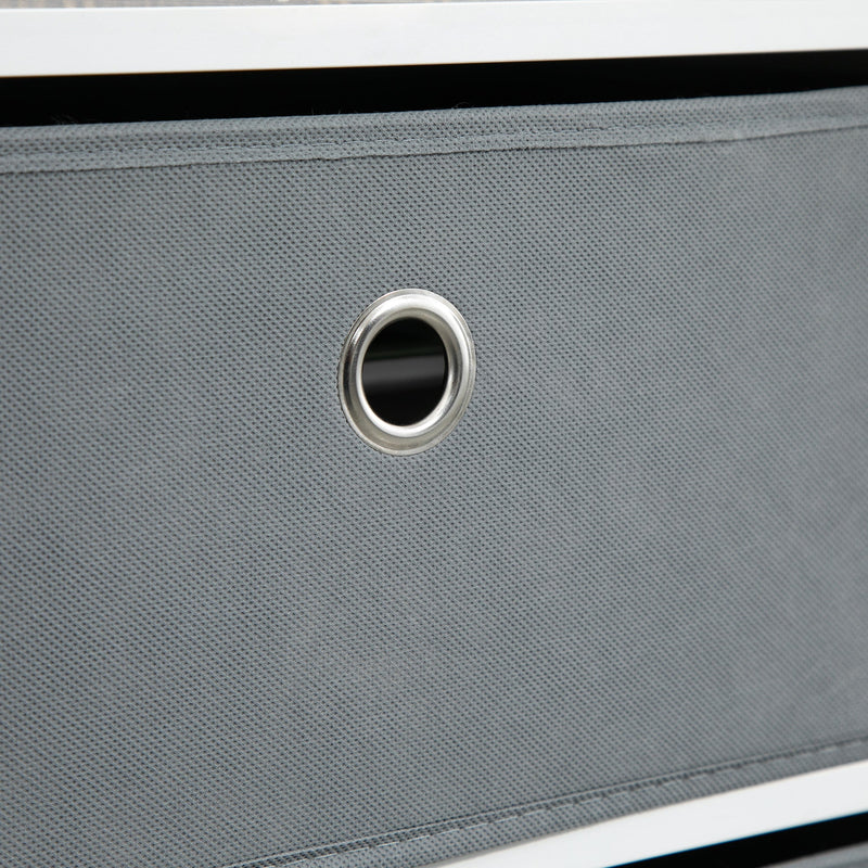 Close-up of the grey fabric drawer front with its metal eyelet pull