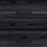Close-up of the black wood-effect drawer fronts and recessed handles