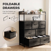 Grey chest of drawers with two bottom fabric drawers pulled out and an inset showing a drawer folded flat