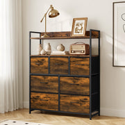 Rustic brown 7-drawer chest of drawers in a bedroom with a lamp, framed photo and radio on the shelves