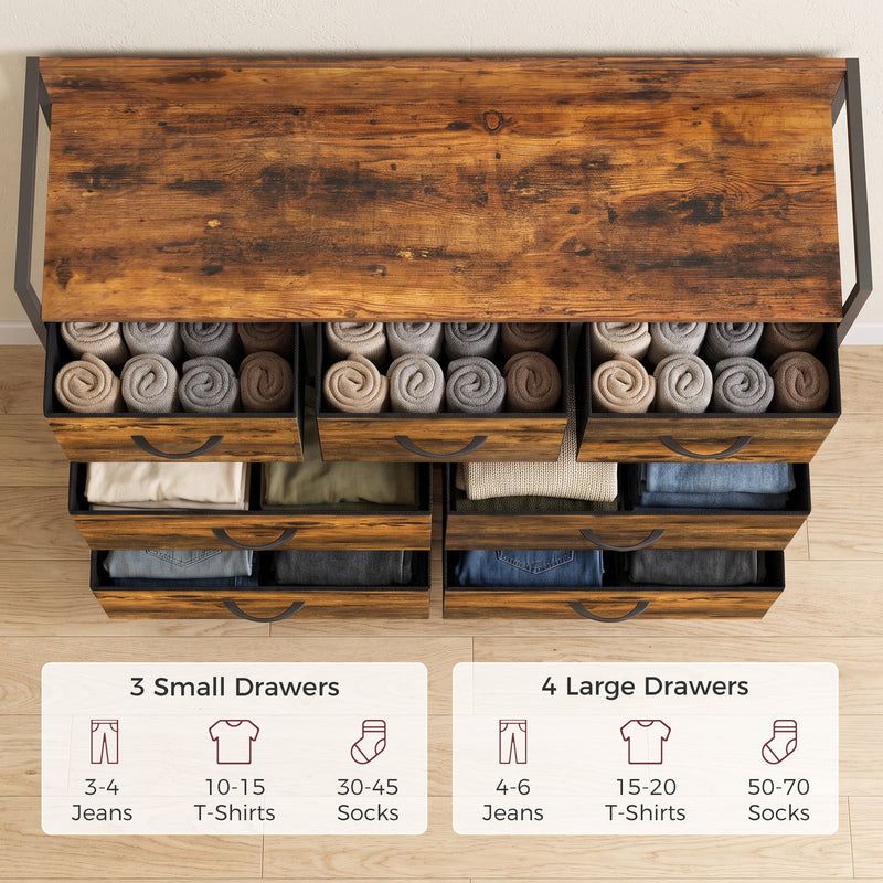 Chest of drawers with rolled socks, jeans and T-shirts in the drawers and a capacity guide for small and large drawers