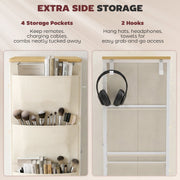 Close-up of the four side storage pockets and two hooks holding everyday items
