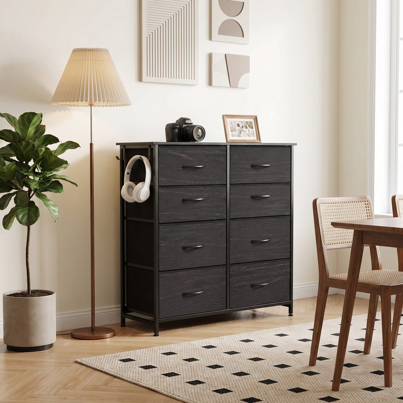 Black 8 drawer fabric chest styled in a bedroom