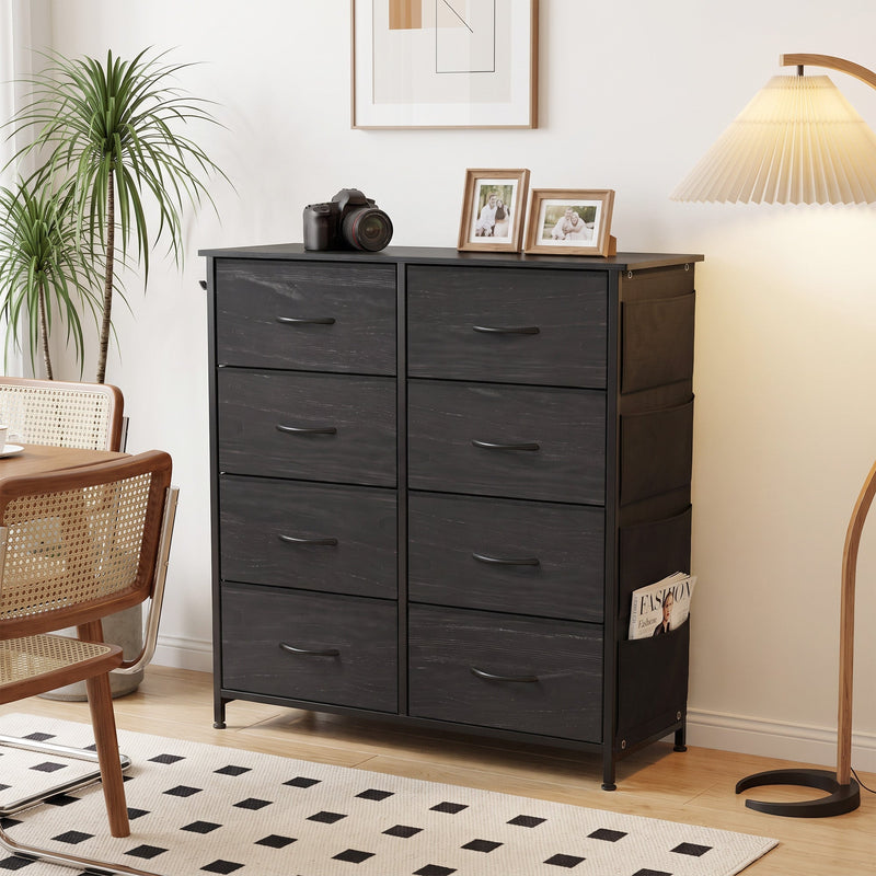 Black 8 drawer fabric chest of drawers, front view in a room