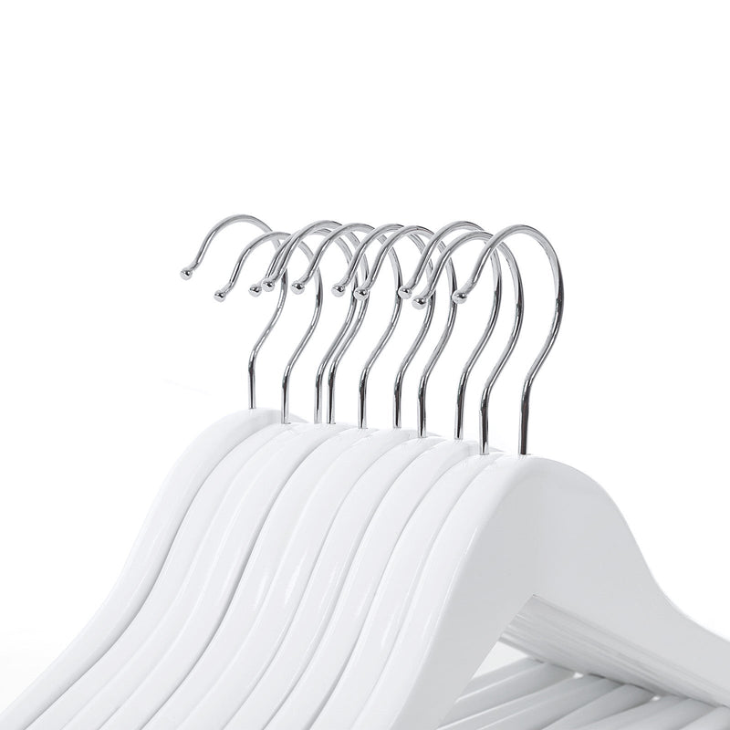 Close-up of the chrome hooks on a row of white children's hangers