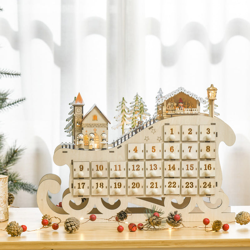 Sleigh advent calendar on a shelf with fir branches, pine cones and red berries