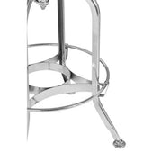 Close-up of chrome bar stool footrest and base