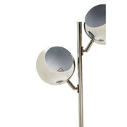 Close-up of polished chrome frame on table lamp