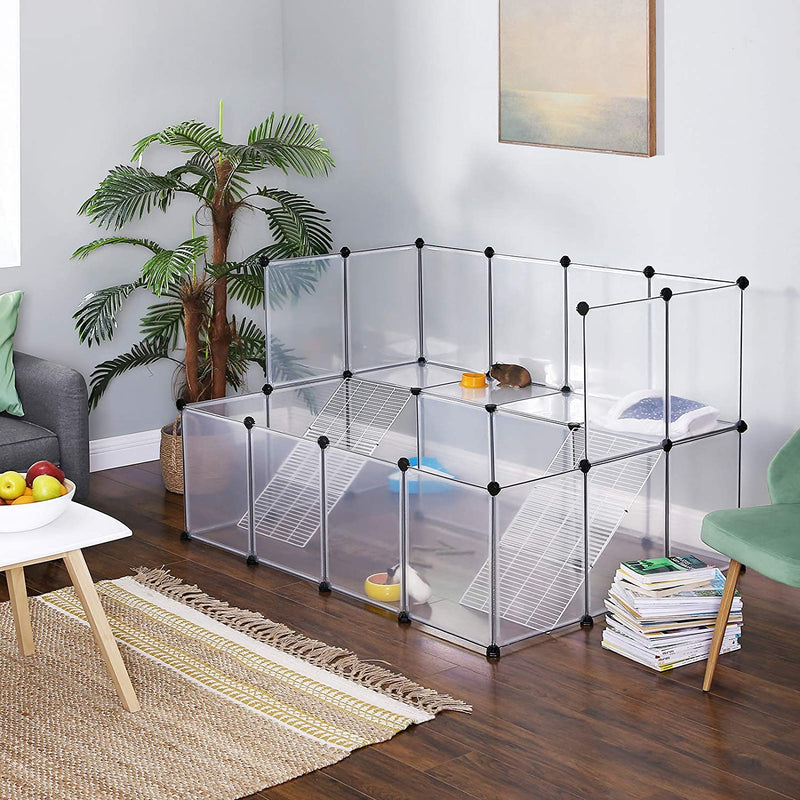 Songmics clear plastic pet playpen styled in a living room with plants
