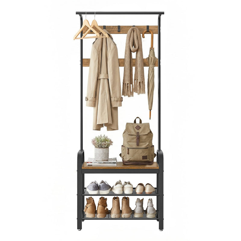 Hall tree with coats, scarves and an umbrella on the rod and hooks, a backpack on the bench and shoes on the shelves