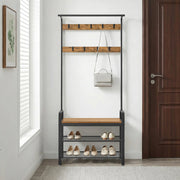 Hall tree beside a front door with a handbag on a hook and shoes on the bench and shelves