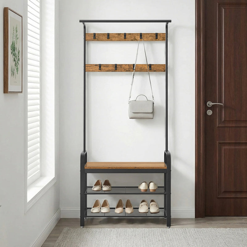 Hall tree beside a front door with a handbag on a hook and shoes on the bench and shelves
