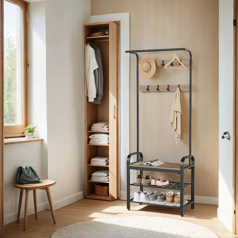 Camel brown and black hall tree beside an open wardrobe in a bright hallway