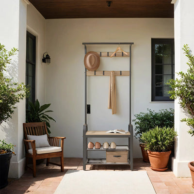 The hall tree on a covered porch with shoes and a basket on its lower shelves